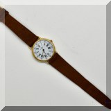 J113. Vintage Movado Swiss watch with brown leather band. Model 87-59-885. - $96 